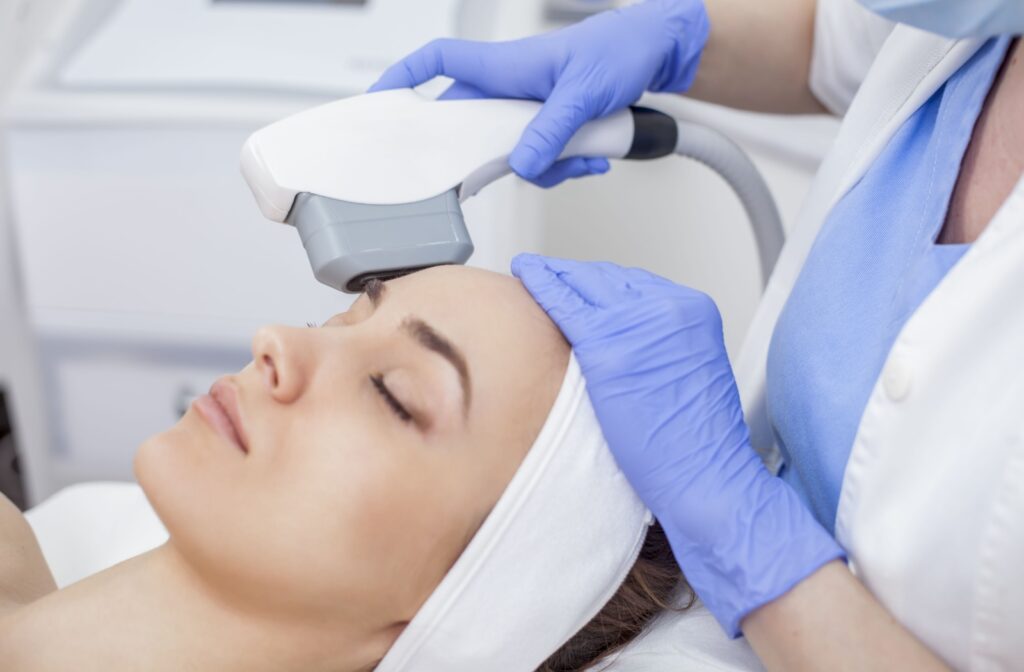 A patient receiving an IPL photofacial treatment for skin rejuvenation.